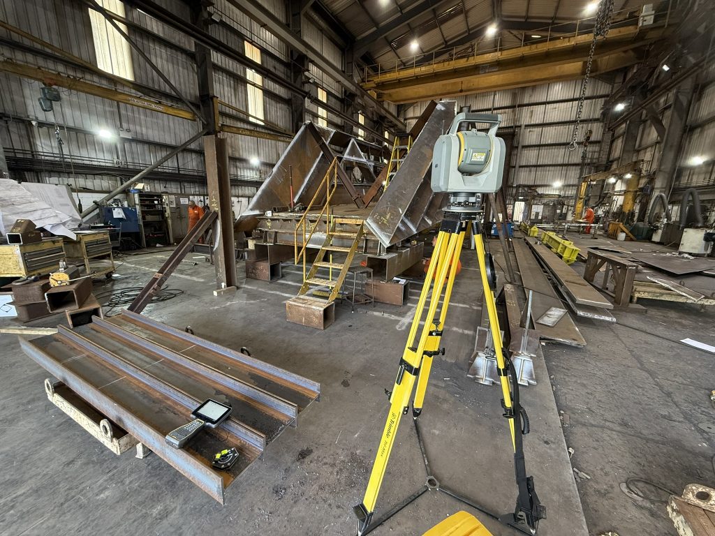 total station being used in the fabrication workshop